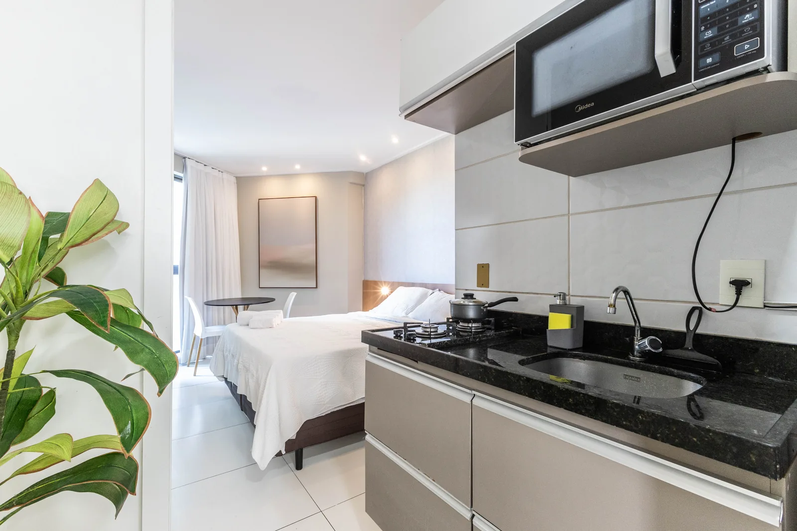 Studio com cozinha e cama